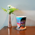 Luxury scented candle with a bold, vibrant Arte Pop design, perfect for modern home decor.